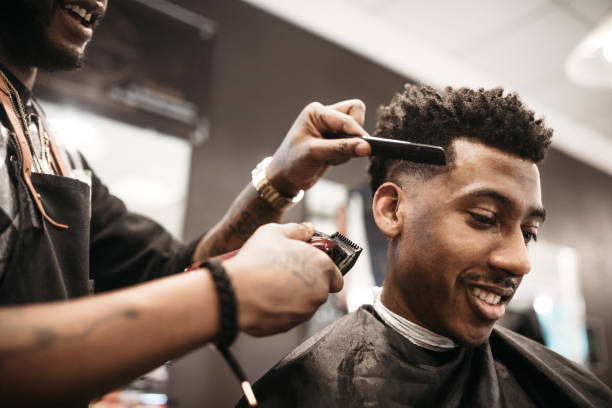 Barber cutting hair